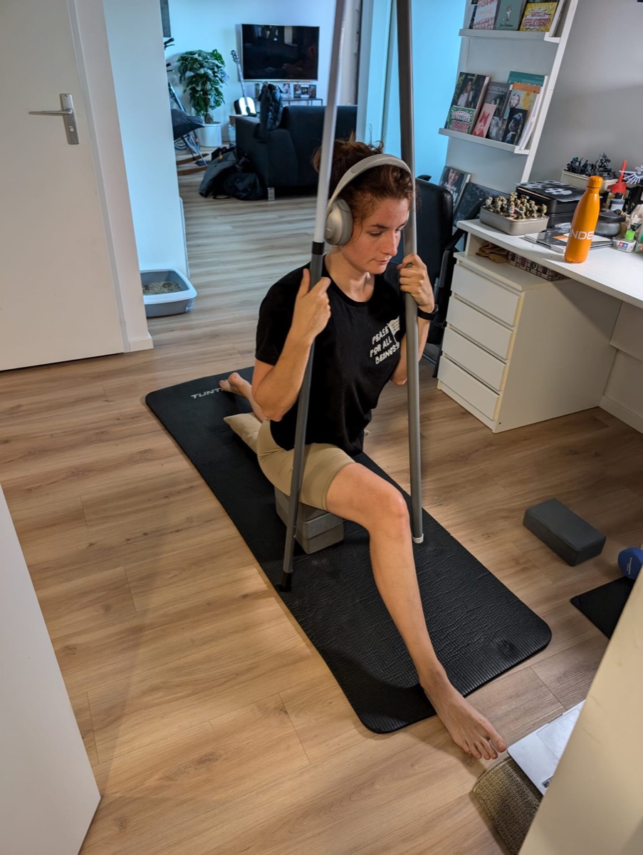 Supple Warriors member training a seated hip opener