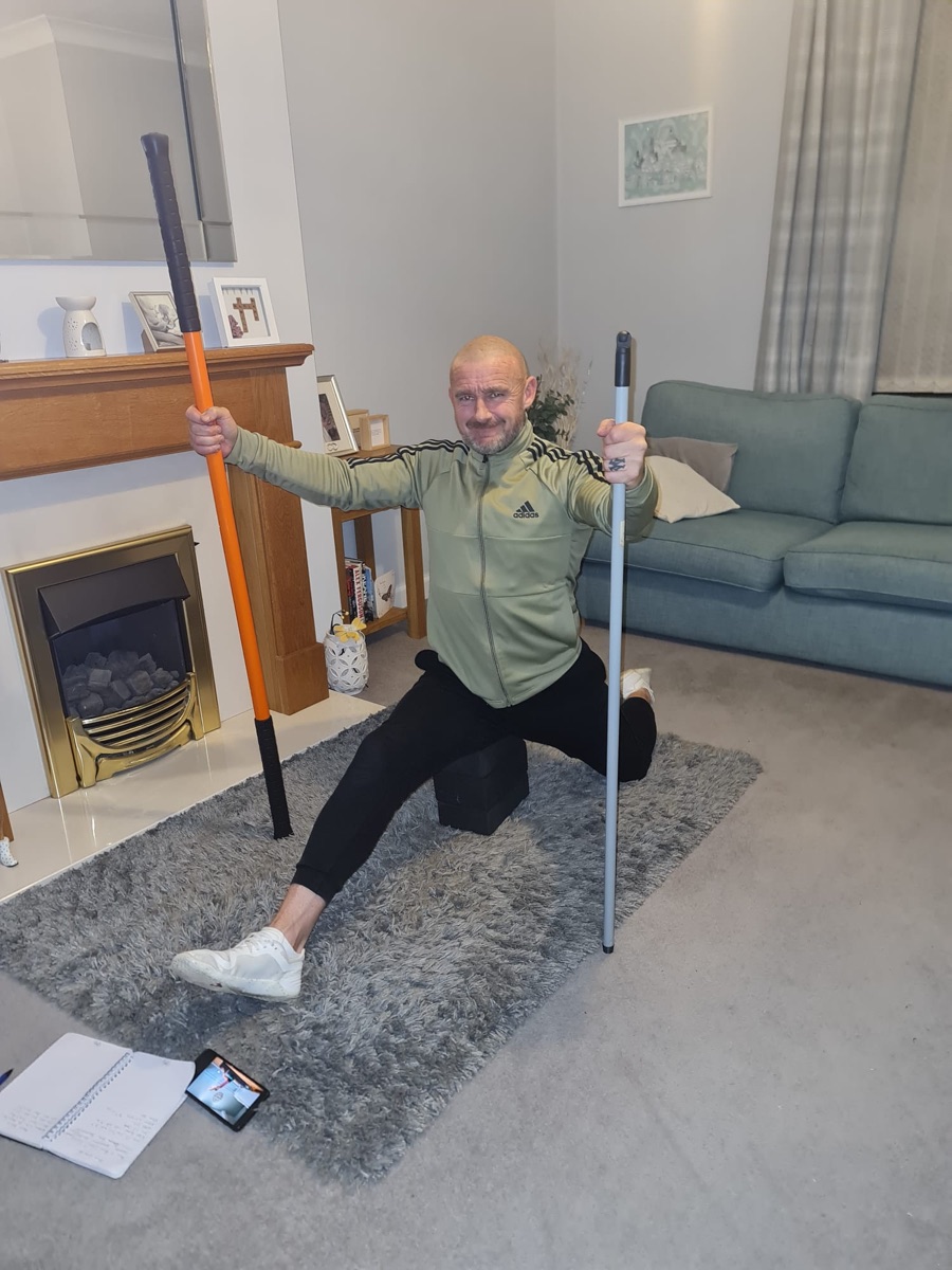 Supple Warriors member training a half-kneeling lunge